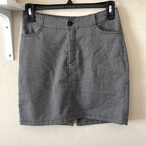 brown, black and creme color mini skirt from brandy melville, never worn!